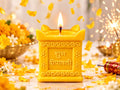 Yellow Shubh Diwali Candle lit among marigolds and Diwali sparklers